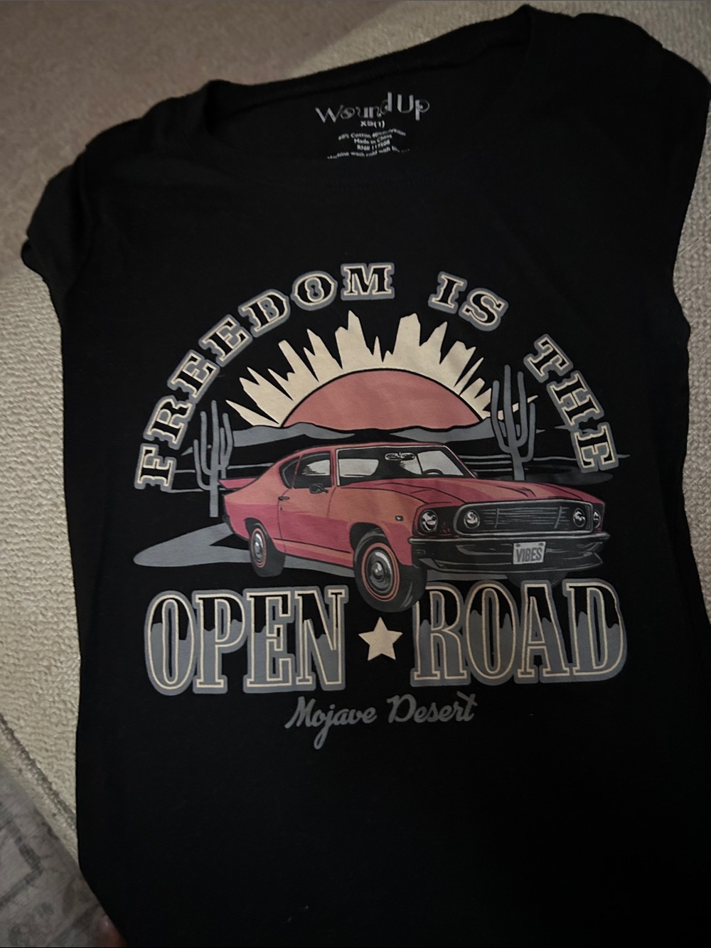 Wound Up Black Tee with Pink Car Desert Graphic